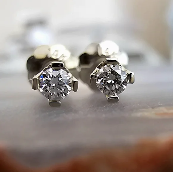 Genuine diamond stud earrings in 14k white gold. - Picture 1 of 6